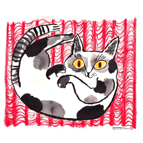 Big cat on the red mat