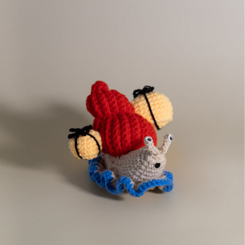 Snail crochet toy